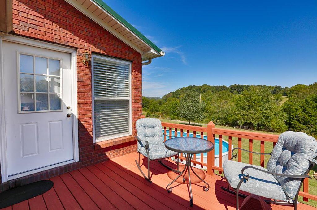 34580 Ardmore Ridge Road Prospect, TN 38477 - Photo 22 of 30 a view of a chairs and table in the balcony