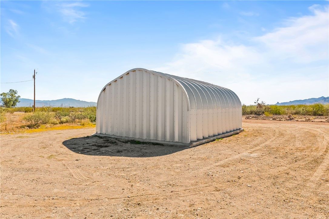 3534 Eloy Road Golden Valley, AZ 86413 - Photo 31 of 58 View of outdoor structure featuring a mountain view
