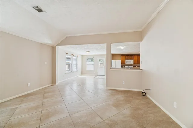 a view of a big room with windows and cabinet