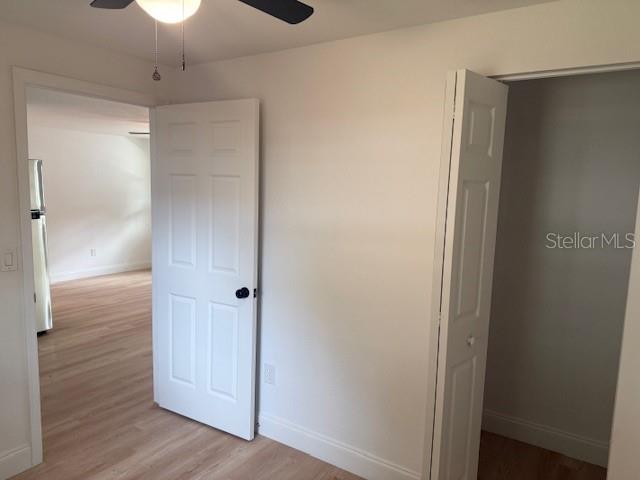 4605 North Hubert Avenue, Unit 19 Tampa, FL 33614 - Photo 12 of 14 a view of a hallway with wooden floor