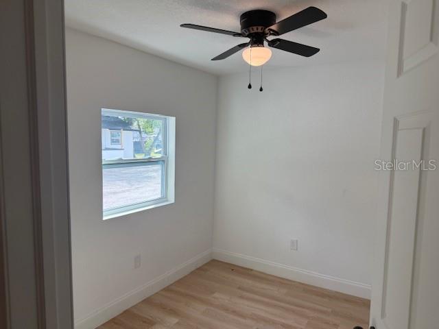 4605 North Hubert Avenue, Unit 19 Tampa, FL 33614 - Photo 13 of 14 an empty room with a window and a fan