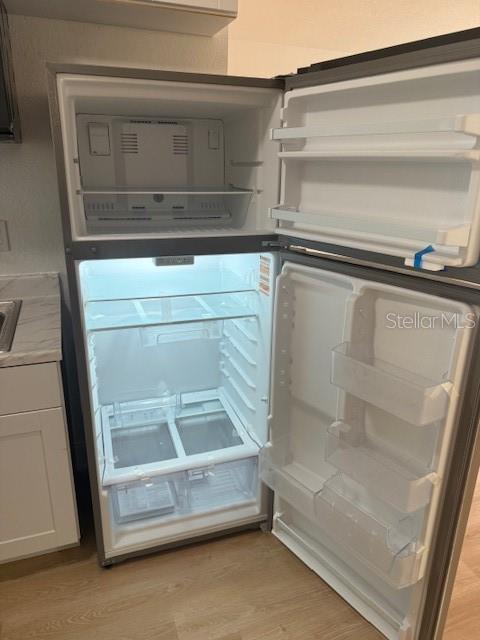 4605 North Hubert Avenue, Unit 19 Tampa, FL 33614 - Photo 9 of 14 a bathroom with a glass door shower