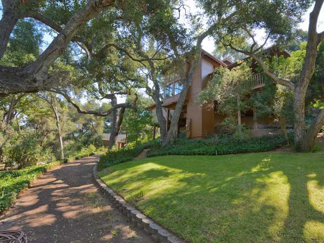 3058 Green Canyon Road Fallbrook, CA 92028 - Photo 21 of 25 On the path leading away from the pond. The Guest House is visible towards the left and the rear of the house is before you