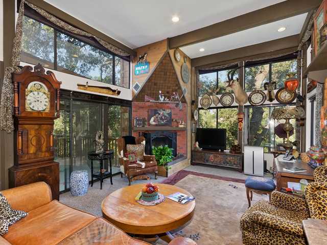 3058 Green Canyon Road Fallbrook, CA 92028 - Photo 5 of 25 Spacious Great Room with soaring ceilings, towering windows, and distinctive fireplace. No window coverings needed because of the oak canopy.