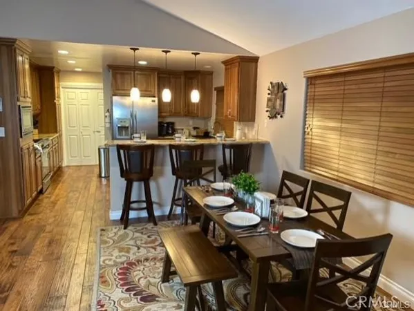 a view of a dining room with furniture