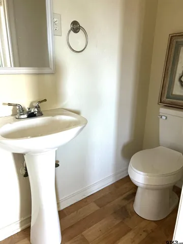 a bathroom with a sink and a toilet