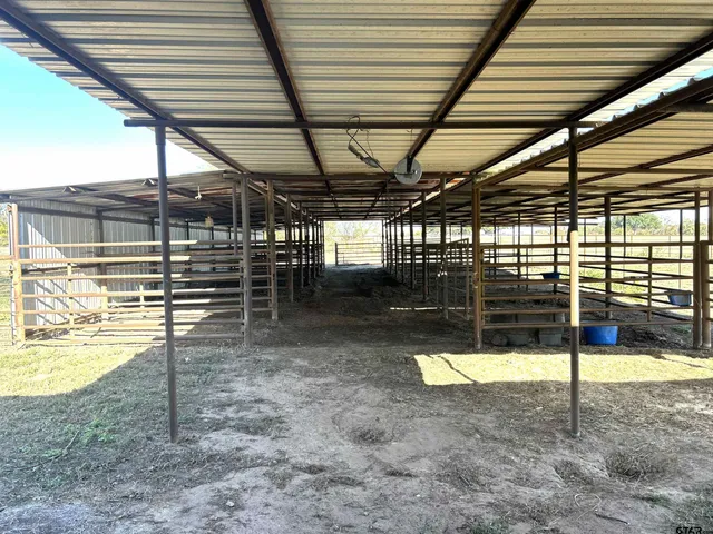 a view of a room with wooden roof