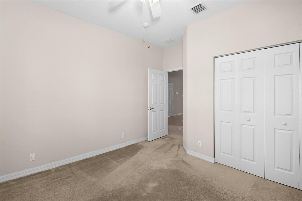 7084 Southeast Cricket Court Stuart, FL 34997 - Photo 24 of 51 an empty room with closet area