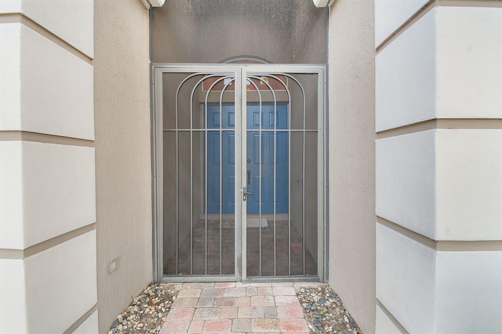 7084 Southeast Cricket Court Stuart, FL 34997 - Photo 3 of 51 a view of a door and a bathroom