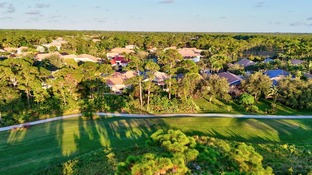 7084 Southeast Cricket Court Stuart, FL 34997 - Photo 33 of 51 a view of swimming pool from a yard