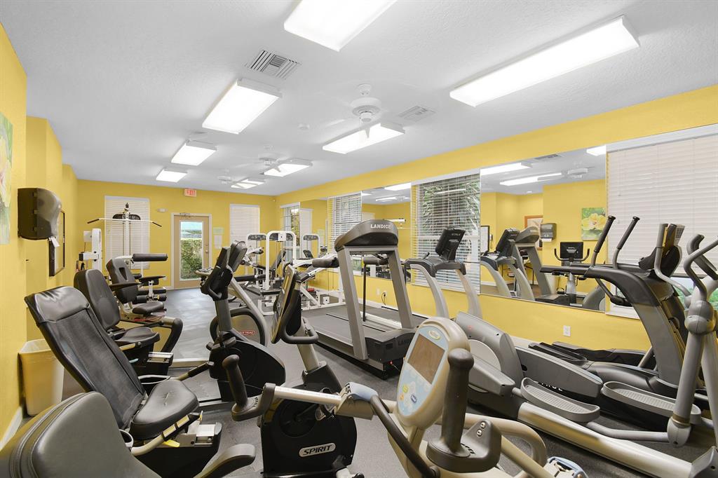 7084 Southeast Cricket Court Stuart, FL 34997 - Photo 45 of 51 a view of a room with gym equipment