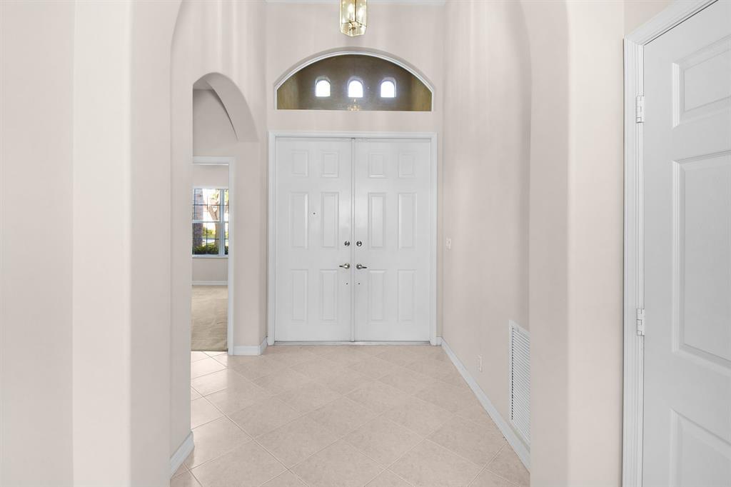 7084 Southeast Cricket Court Stuart, FL 34997 - Photo 5 of 51 a view of a livingroom with wooden floor