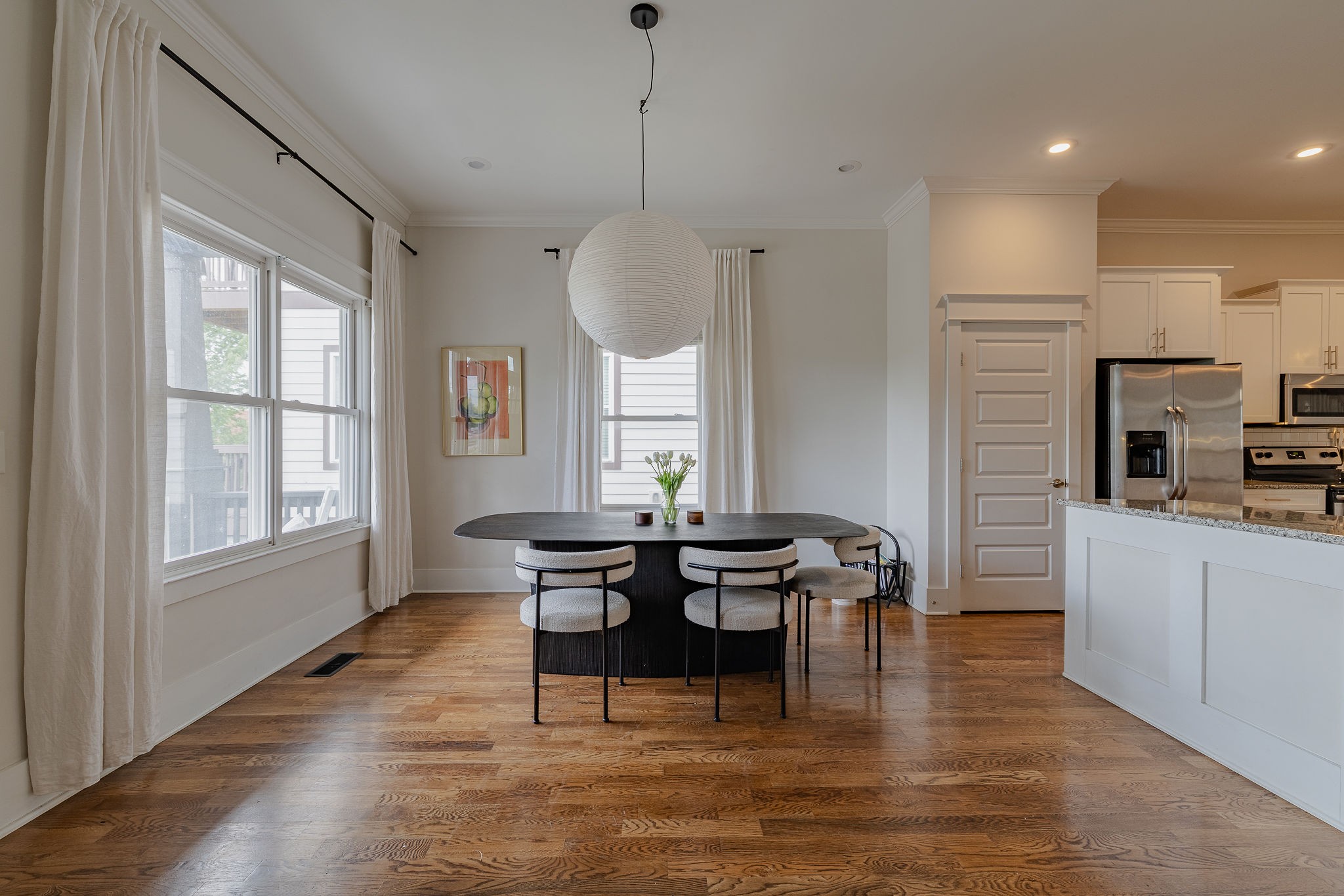 6218 B Morrow Road Nashville, TN 37209 - Photo 7 of 35 a view of a dining room with furniture window and wooden floor