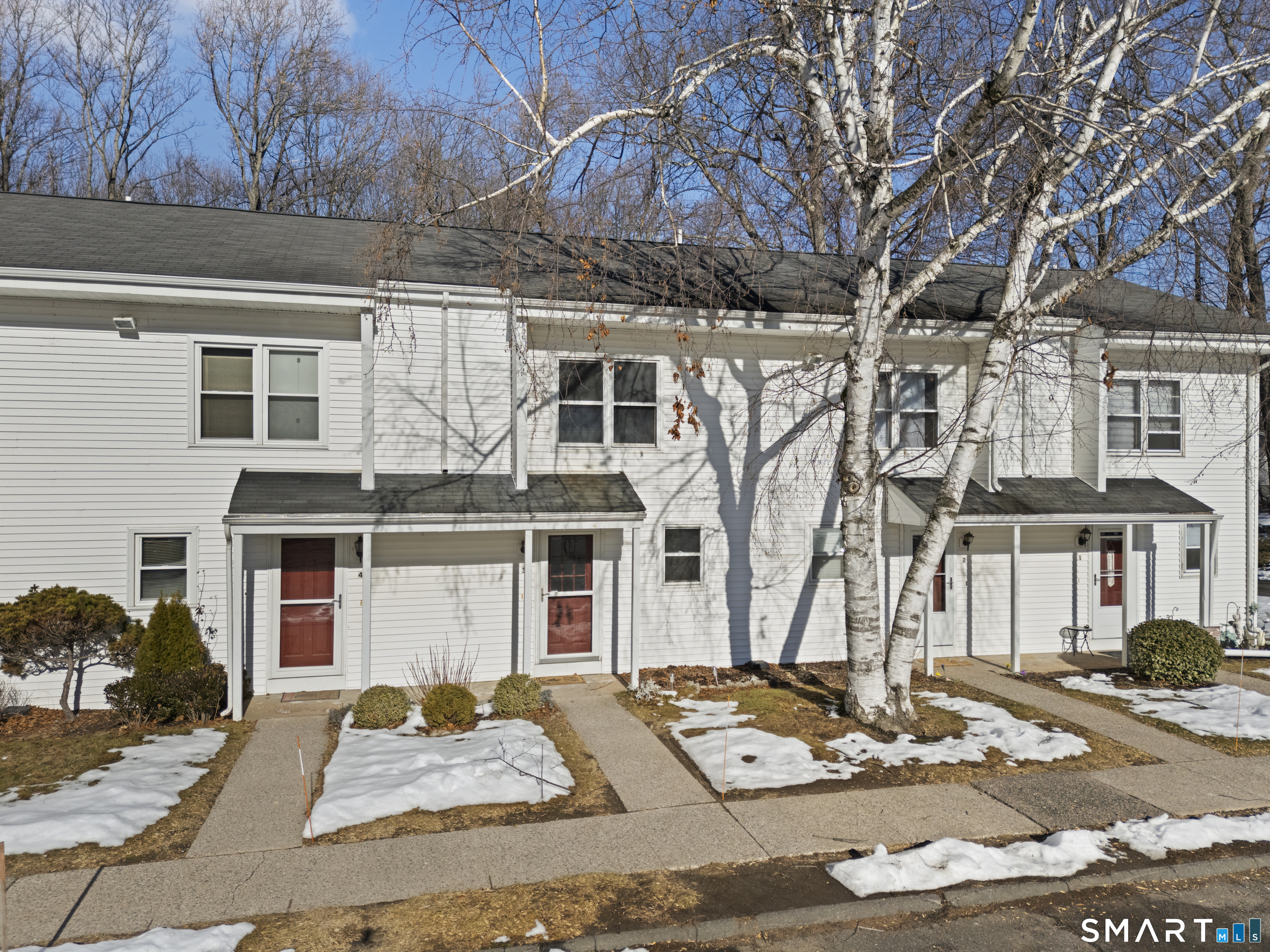 a front view of a building with street view