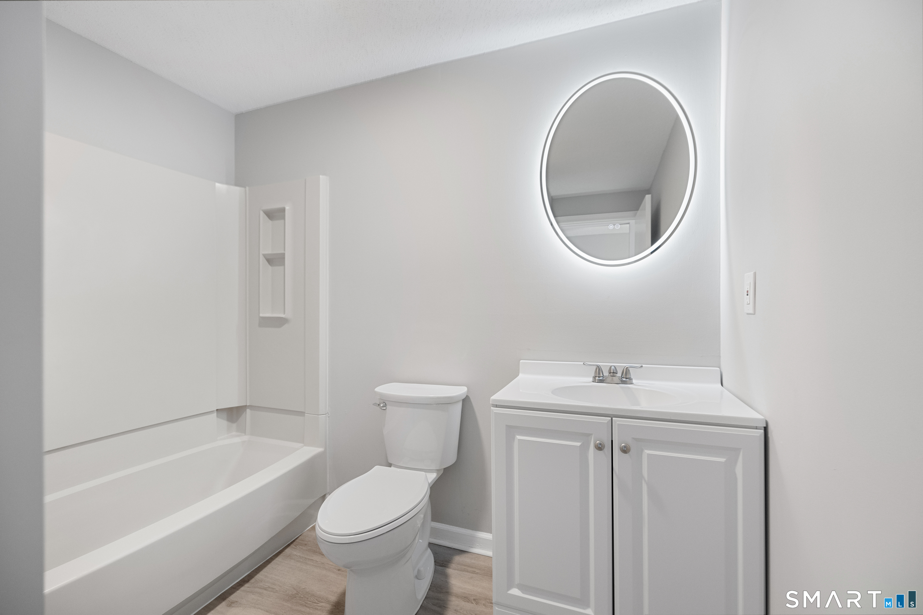 181 Sherbrook Street, Unit A3 Bristol, CT 06010 - Photo 13 of 18 a bathroom with a sink toilet and a bathtub