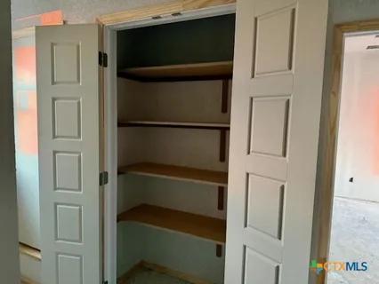 a view of walk in closet