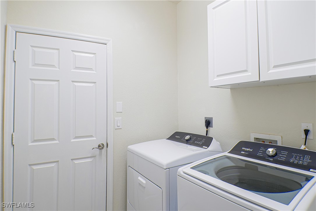 8876 Falcon Pointe Loop Fort Myers, FL 33912 - Photo 22 of 31 a utility room with dryer and washer