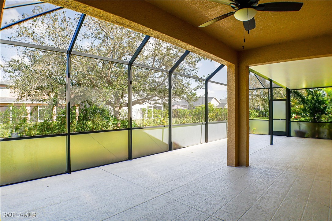 8876 Falcon Pointe Loop Fort Myers, FL 33912 - Photo 25 of 31 a view of an outdoor space with a large window