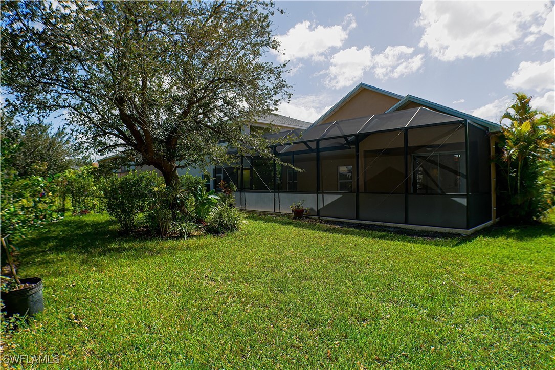 8876 Falcon Pointe Loop Fort Myers, FL 33912 - Photo 26 of 31 a view of a garden