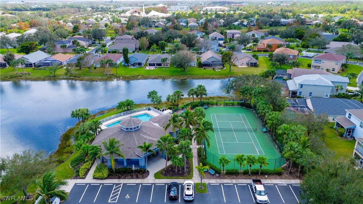 8876 Falcon Pointe Loop Fort Myers, FL 33912 - Photo 27 of 31 an aerial view of residential houses with outdoor space and swimming pool