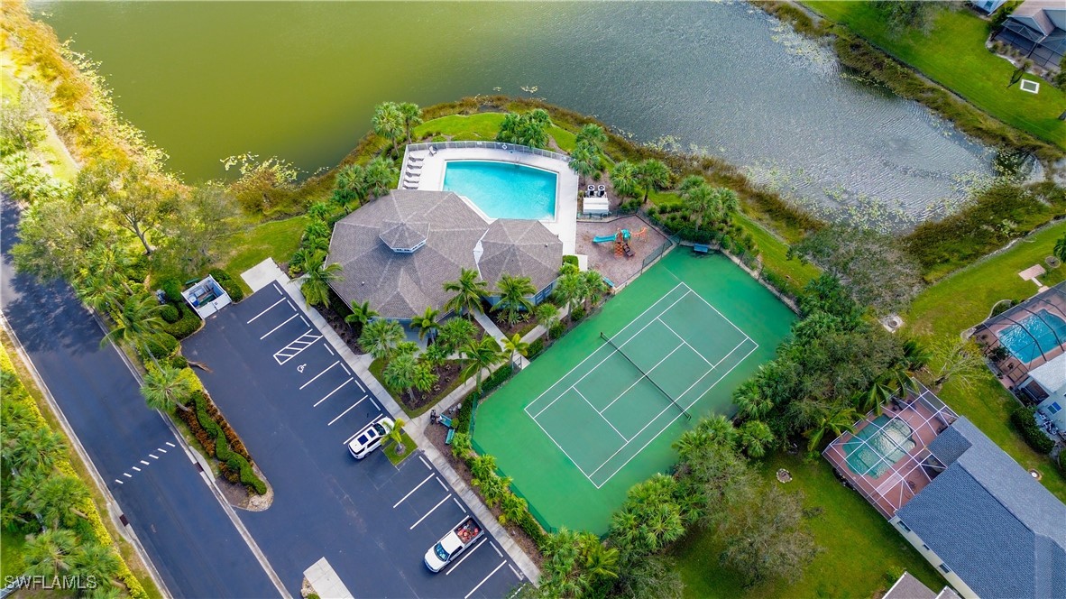 8876 Falcon Pointe Loop Fort Myers, FL 33912 - Photo 28 of 31 an aerial view of a house with a yard basket ball court and outdoor seating