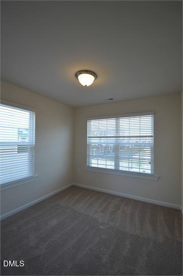 2021 Hayes Lane Holly Springs, NC 27540 - Photo 11 of 25 an empty room with a window