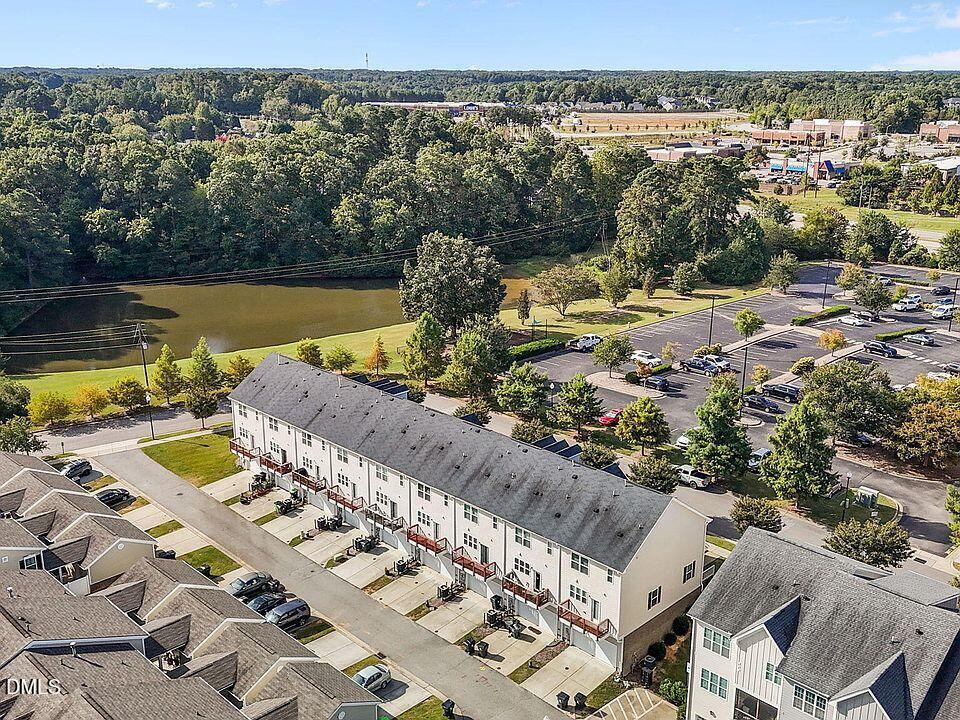 2021 Hayes Lane Holly Springs, NC 27540 - Photo 16 of 25 a view of a city with an ocean