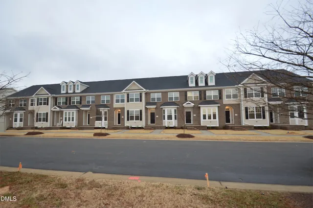 a front view of a building with street view