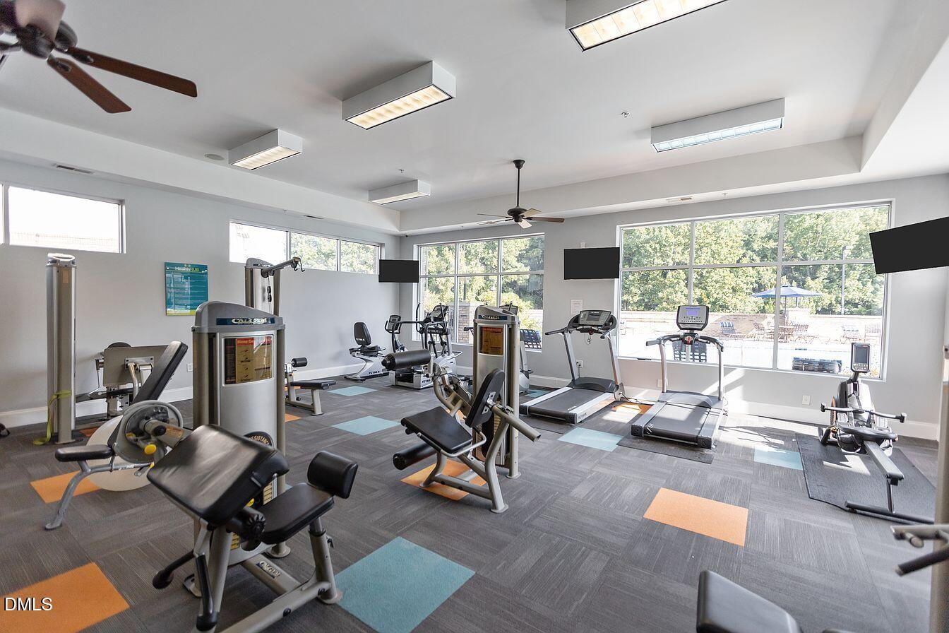 2021 Hayes Lane Holly Springs, NC 27540 - Photo 25 of 25 a view of a room with gym equipment