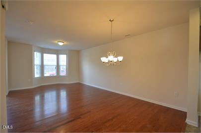 2021 Hayes Lane Holly Springs, NC 27540 - Photo 8 of 25 a view of an empty room with a window