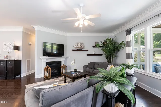a view of a dining room with furniture and window