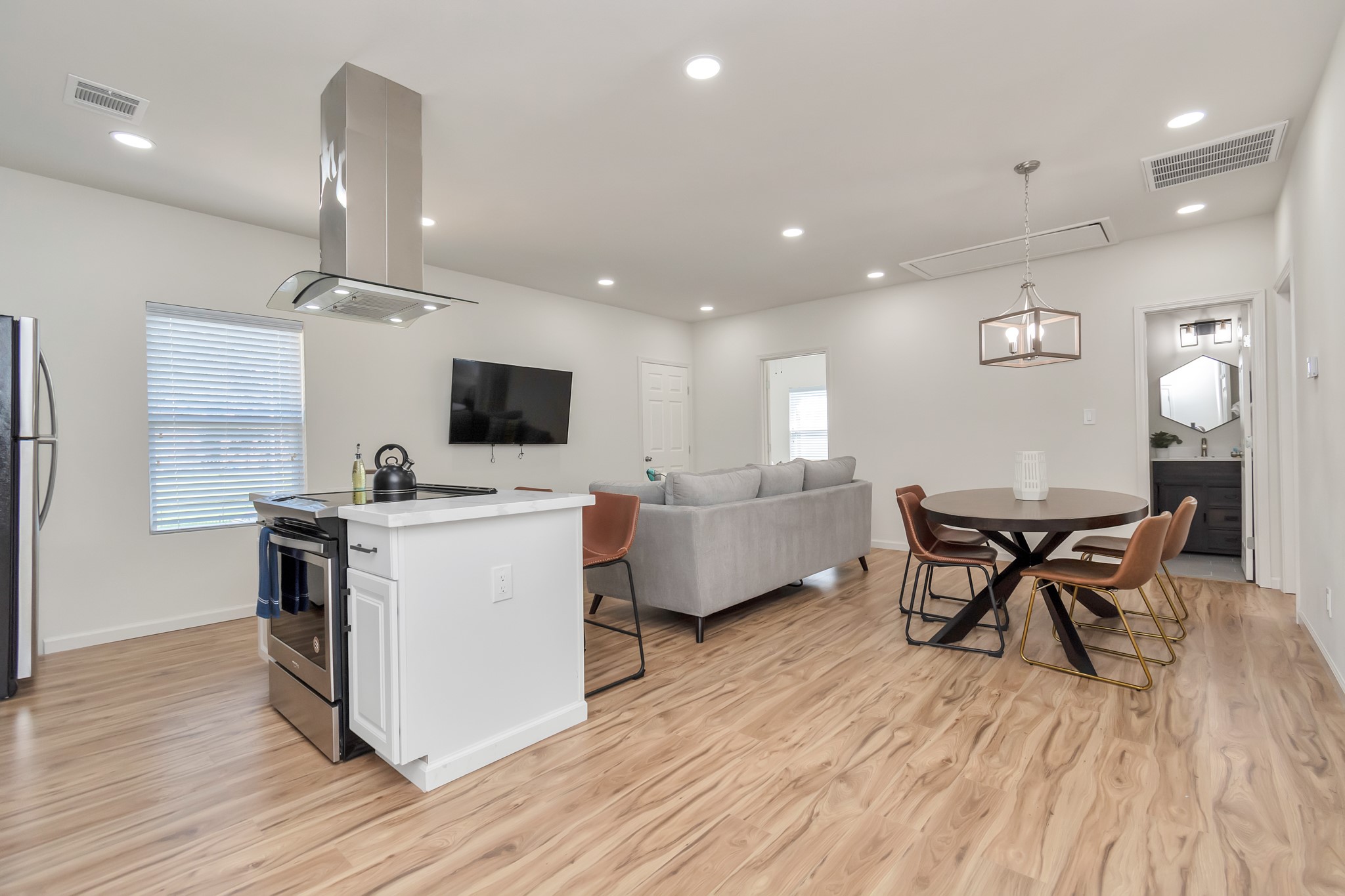 1812 Wheeler Avenue Houston, TX 77004 - Photo 23 of 34 a view of kitchen with cabinets and wooden floor
