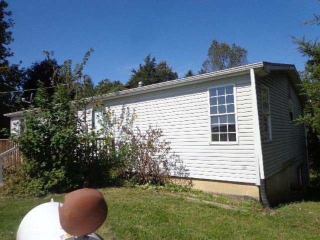 5614 Reeder Road Lyons, MI 48851 - Photo 3 of 24 263-393743 back side (2)