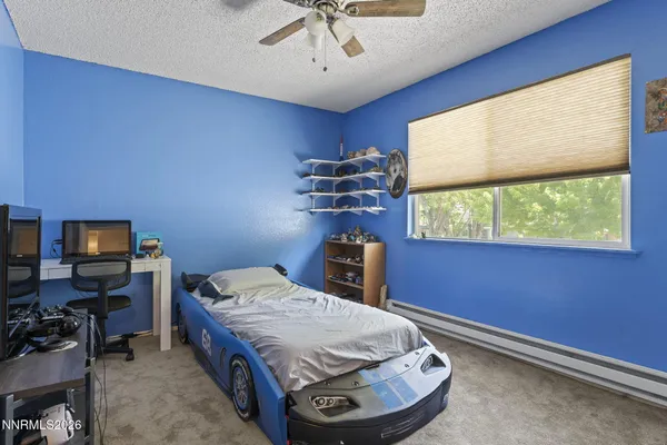 a room with a bed and a window