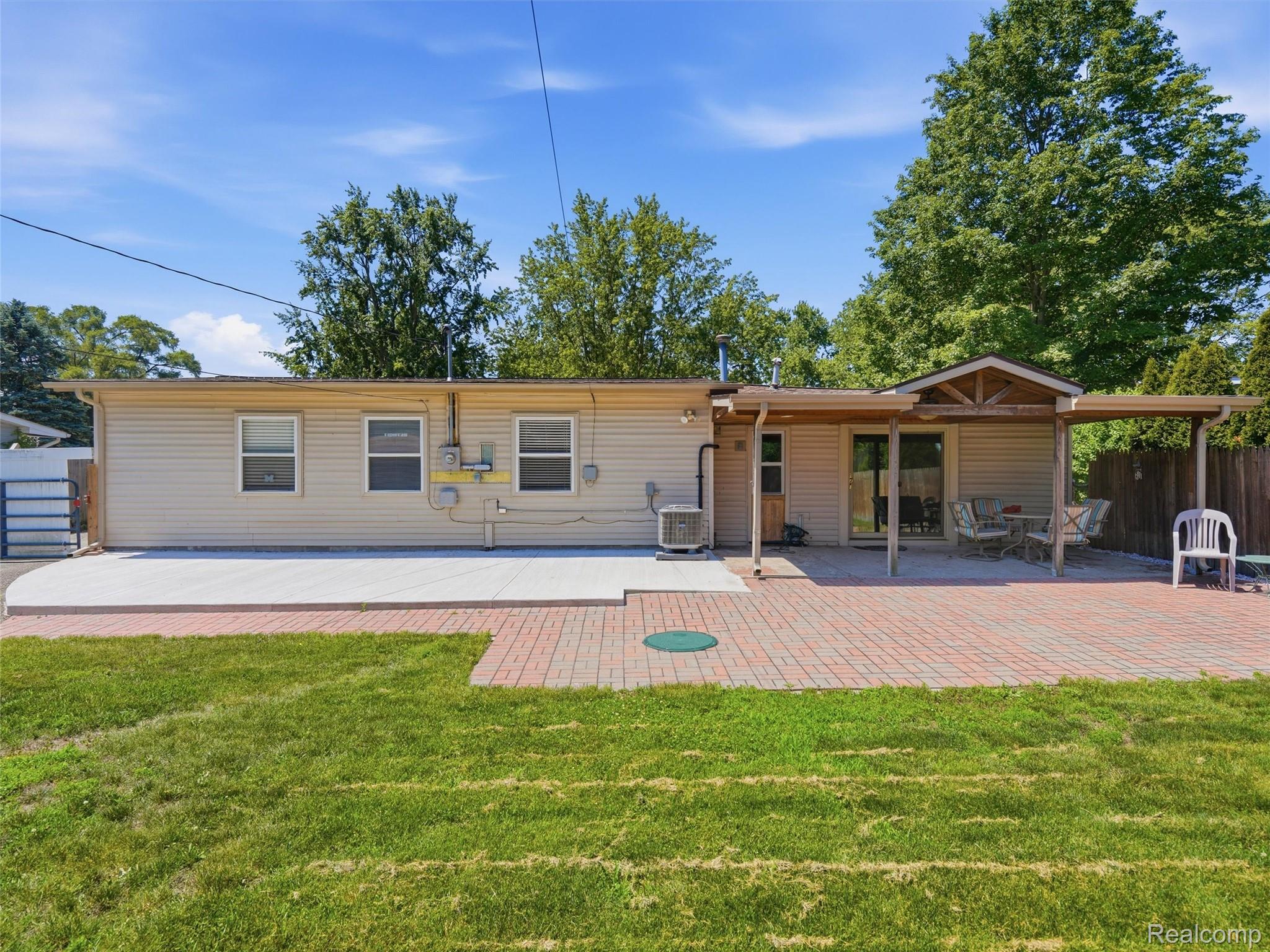 6271 Stephen Brighton, MI 48116 - Photo 6 of 28 New Concrete Patio and Brick Paver Patio