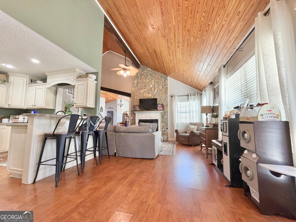 3231 Pear Avenue Patterson, GA 31557 - Photo 11 of 43 a view of kitchen with furniture and wooden floor