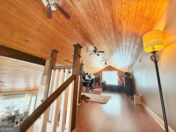 a view of entryway livingroom and hall