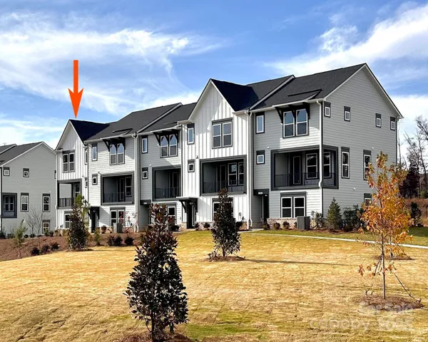 a view of a building with a swimming pool