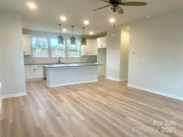 a view of kitchen and sink