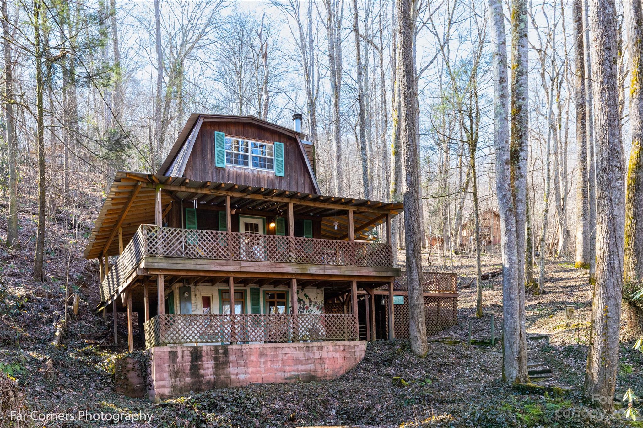 523 Spring Lake Road Maggie Valley, NC 28751 - Photo 25 of 25 a front view of a house with balcony