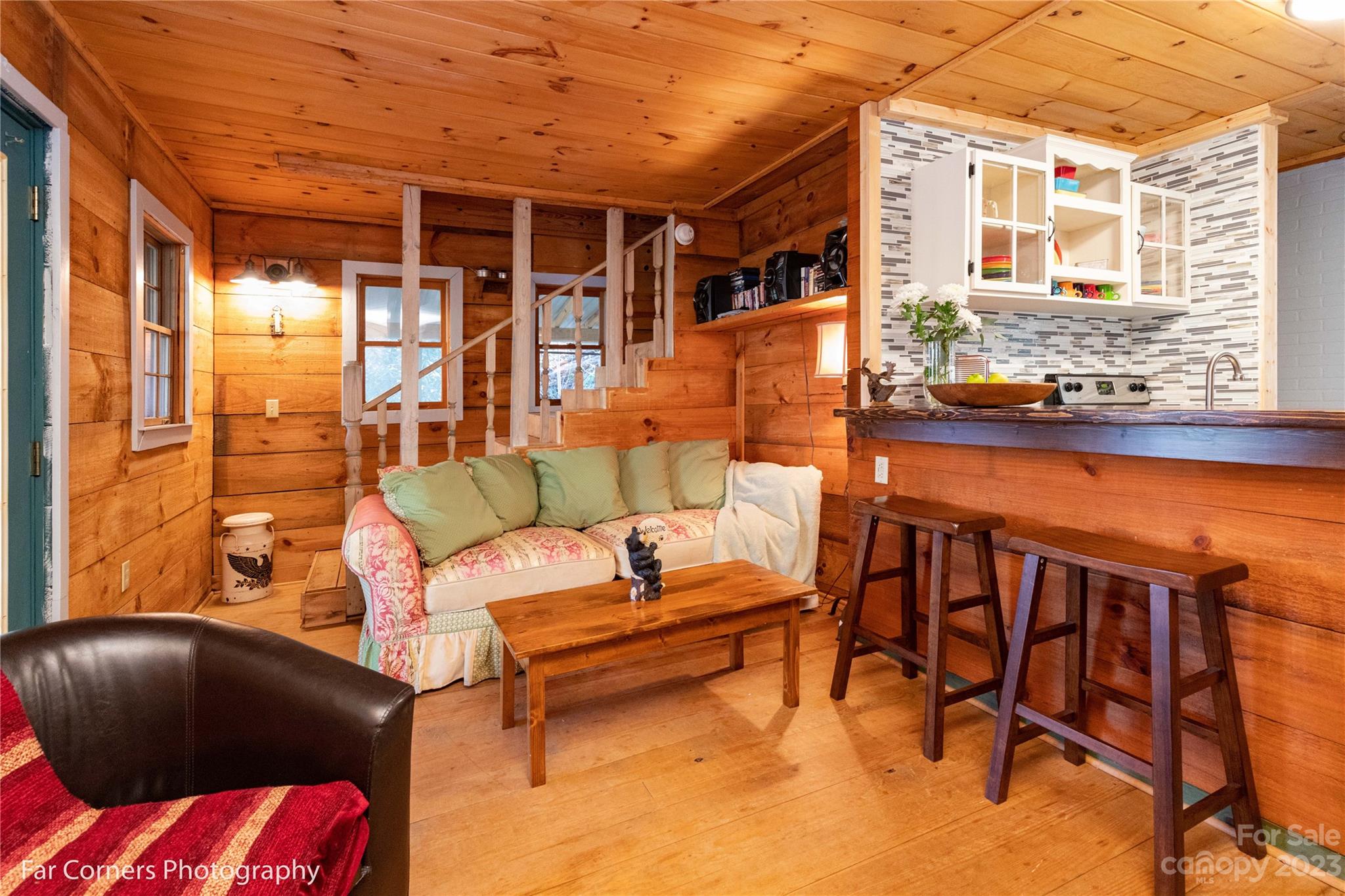 523 Spring Lake Road Maggie Valley, NC 28751 - Photo 5 of 25 a outdoor living space with furniture and natural light