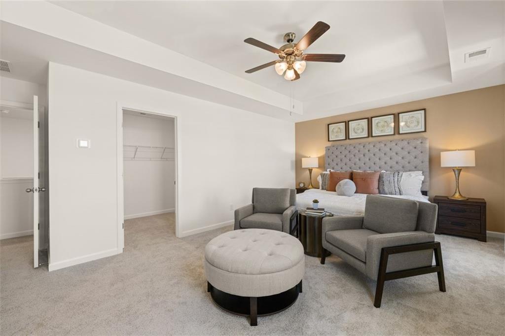 182 Aster Avenue Locust Grove, GA 30248 - Photo 24 of 48 a living room with furniture and a rug