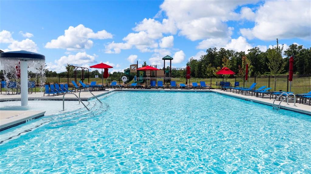 182 Aster Avenue Locust Grove, GA 30248 - Photo 4 of 48 a view of a fountain in front of house