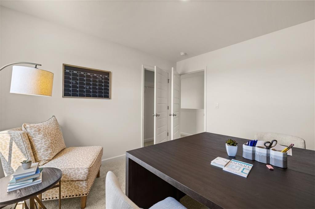 182 Aster Avenue Locust Grove, GA 30248 - Photo 43 of 48 a workspace with furniture and window