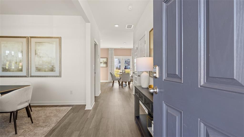 182 Aster Avenue Locust Grove, GA 30248 - Photo 46 of 48 a view of a living room and dining room