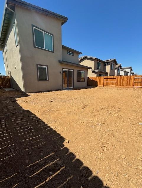 3109 Sirama Way Rancho Cordova, CA 95742 - Photo 6 of 8 a backyard of a house with wooden fence