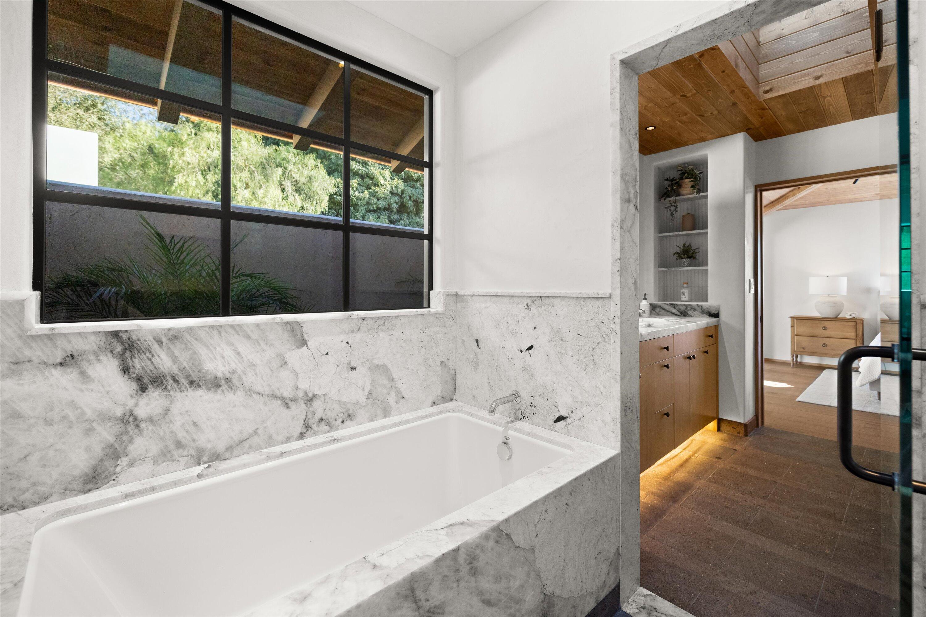 734 El Rancho Road Montecito, CA 93108 - Photo 14 of 24 a bathroom with a bathtub and a sink