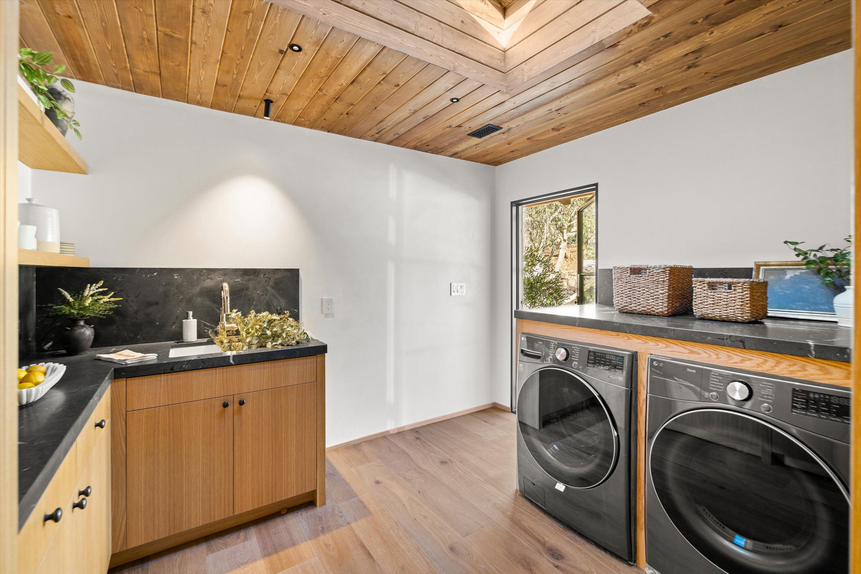 734 El Rancho Road Montecito, CA 93108 - Photo 17 of 24 a kitchen with sink and cabinets