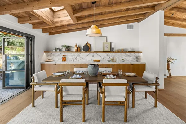 a view of a dining room with furniture