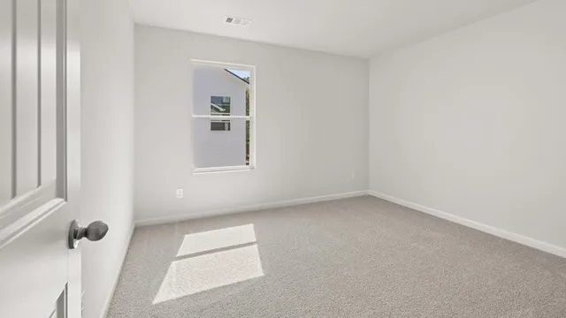 a aerial view of a house with swimming pool and garden